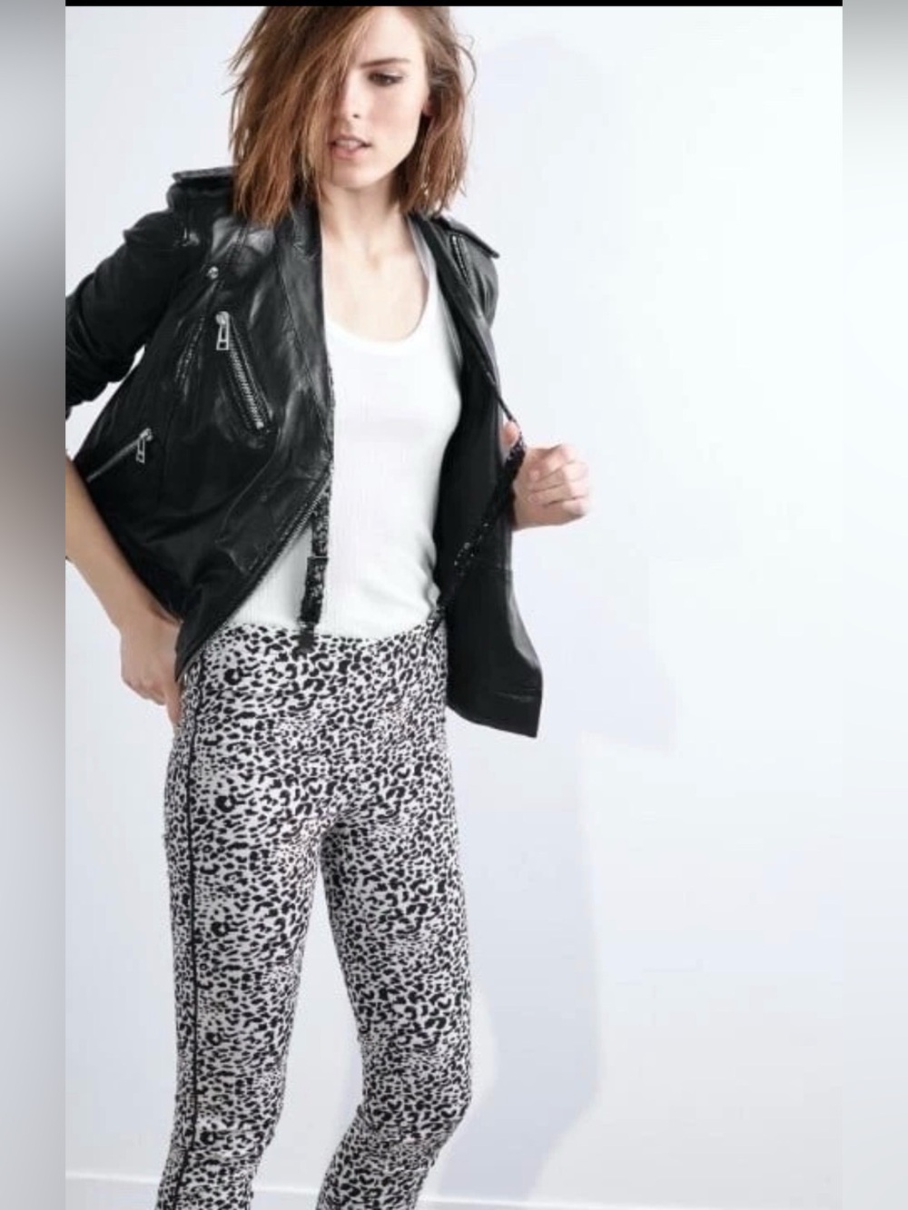 Cheetah print pants with stripe on side chic and classy but edgy too